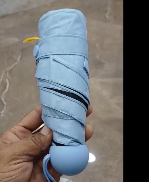 Pocket-Sized Power: Mini Capsule Umbrella – Ultra-Compact, Stylish & Travel-Ready